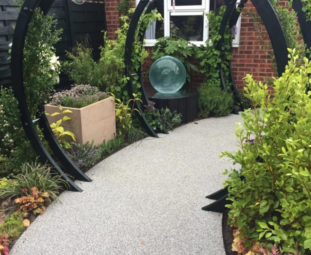 Love Your Garden's not only catered to Isla's love for water but also added a touch of sophistication Love Your Garden's not only catered to Isla's love for water but also added a touch of sophistication