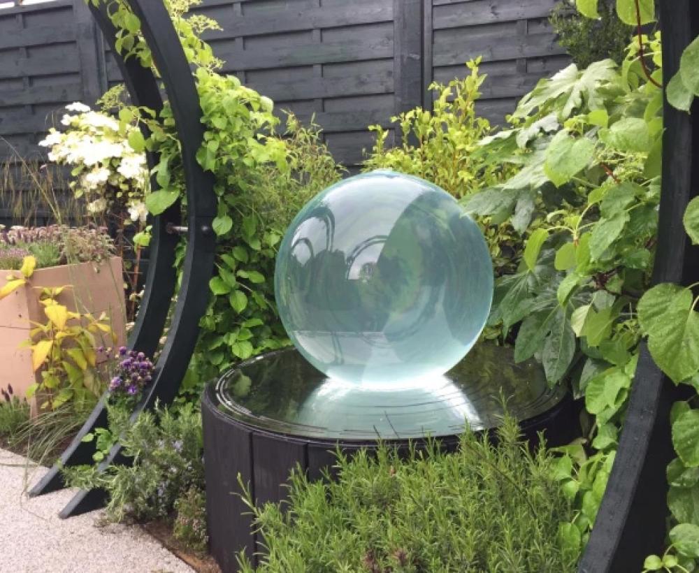 Love Your Garden's not only catered to Isla's love for water but also added a touch of sophistication Love Your Garden's not only catered to Isla's love for water but also added a touch of sophistication